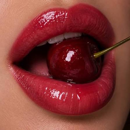 Glossy cherry cola lips with brown lip liner and berry lipstick
Deep burgundy cherry cola lip makeup for an evening look
Soft everyday cherry lip combination with brown liner
Chocolate brown liner with glossy cherry red lipstick